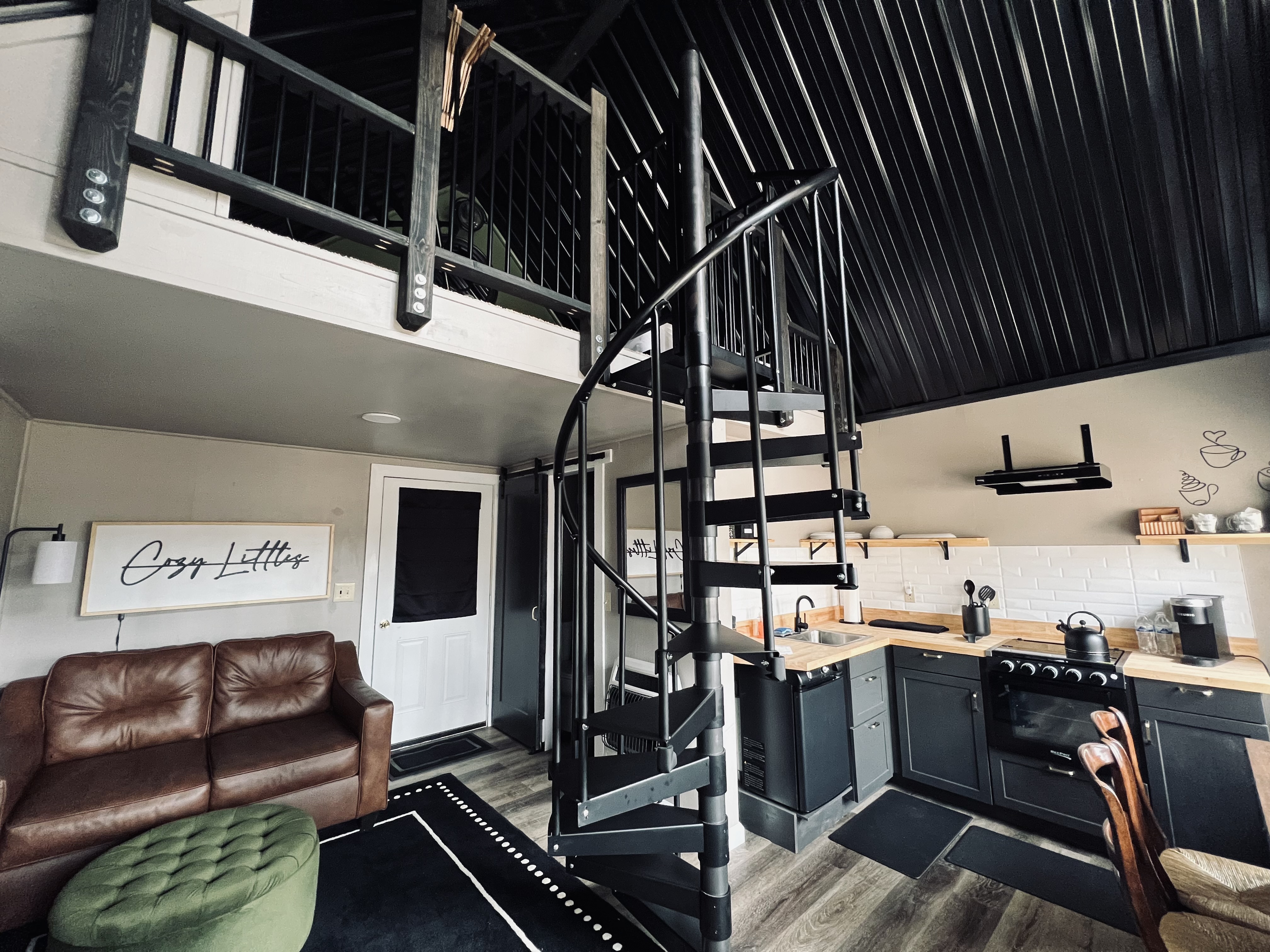 Narrow spiral staircase inside cabin